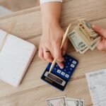 Person checking bills and records to find out who owns my debt