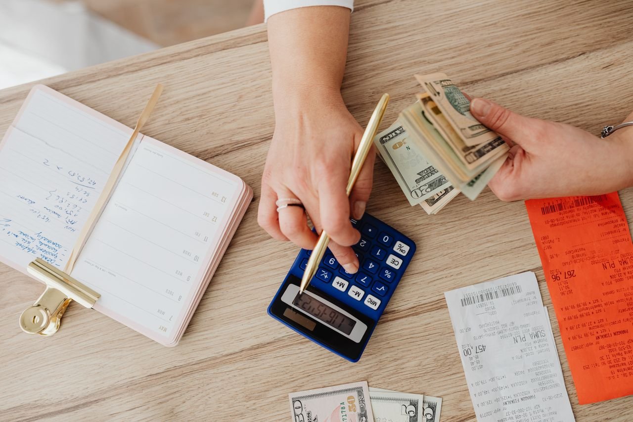 Person checking bills and records to find out who owns my debt
