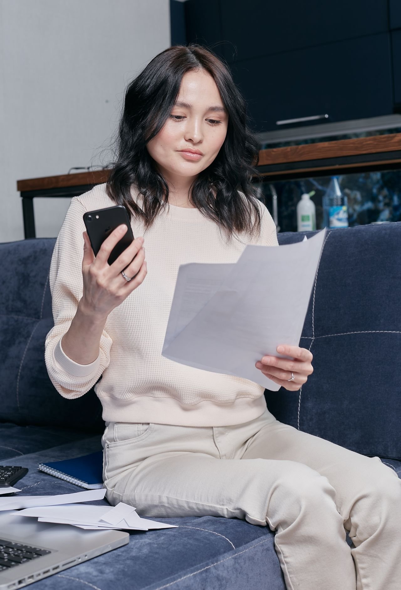 Woman reading documents about a default judgment for debt